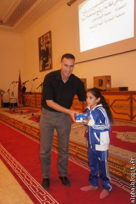 Avec Soumya el Bo3azaoui, bénéficiaire de l'accompagnement scolaire